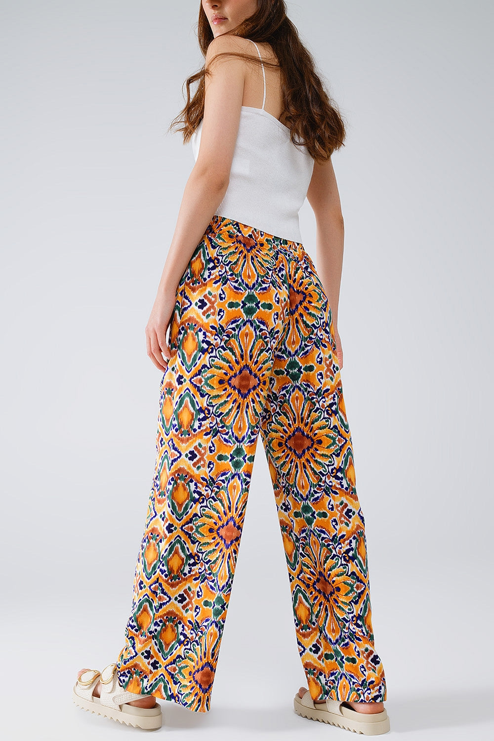 Multicolor Pants With Flower Print In Orange And Blue - Trousers