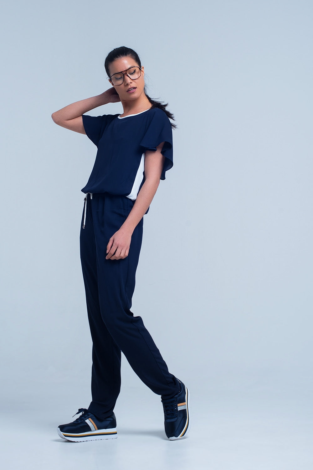 Navy blue jumpsuit with short sleeve and ruffle detail - Dresses