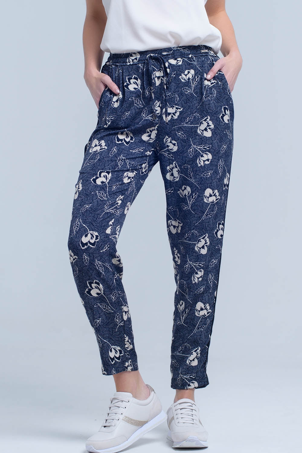 Navy blue pants with floral print - Trousers