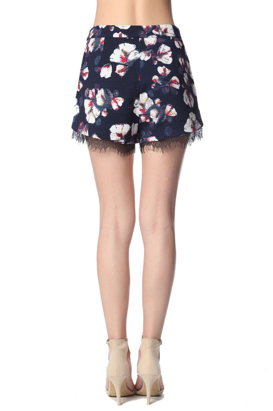 Navy blue shorts in floral print with lace detail - Trousers