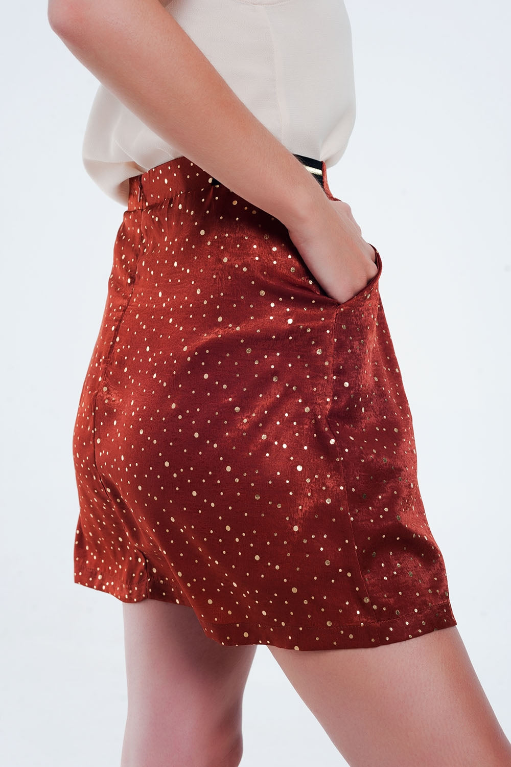 Orange mini skirt with pleats in gold polka dot - Skirts