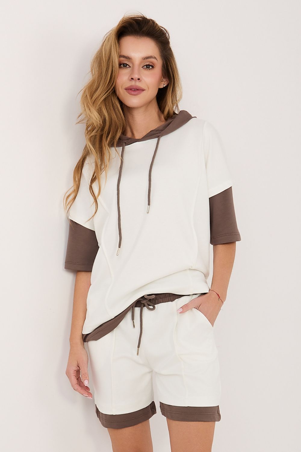 Rue Paris outfit set featuring a comfy hoodie and matching shorts in cream and brown tones