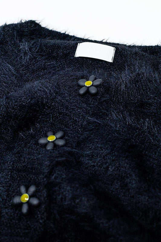 Short and fluffy black cardigan with flower buttons - Cardigans