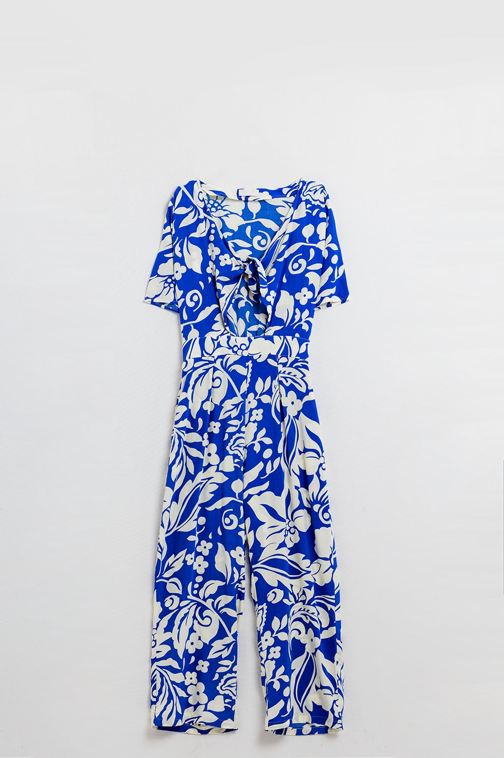 Short Sleeve Key Hole Front Floral Jumpsuit In Blue - Dresses