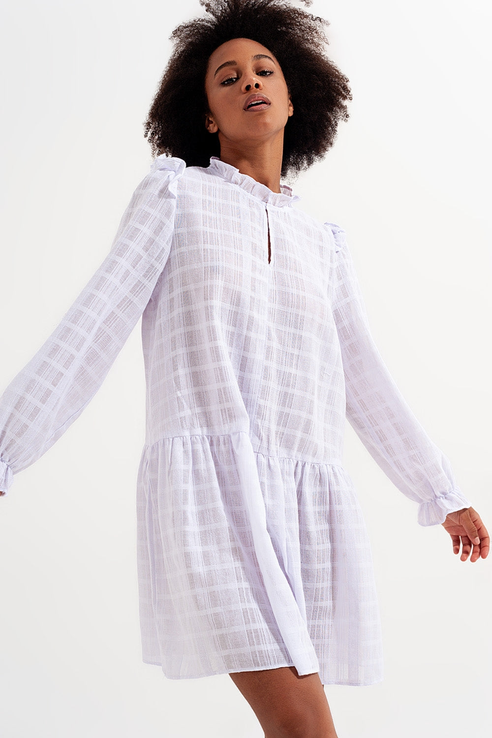 Voluminous mini dress with ruffles in white - Dresses