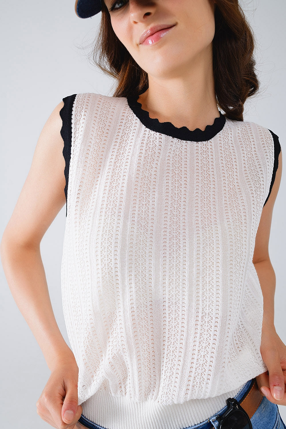 white knitted pointelle top with black wavy trim - Jumpers
