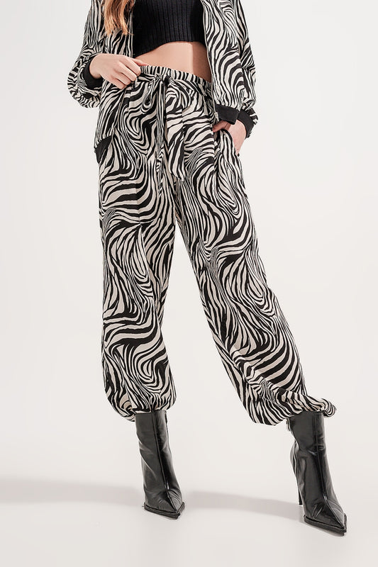 Wide leg trousers in zebra print - Trousers