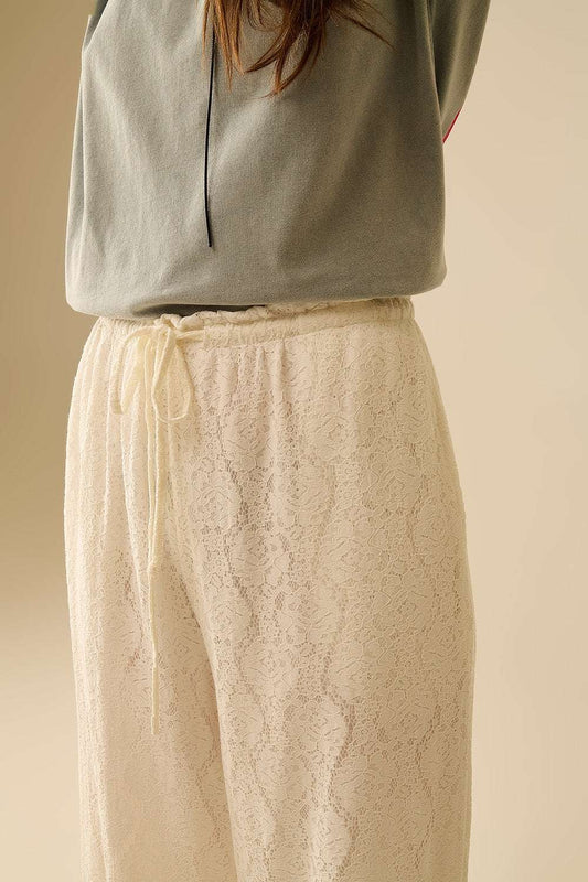 wide-legged lace pants with elastic waistband - Trousers