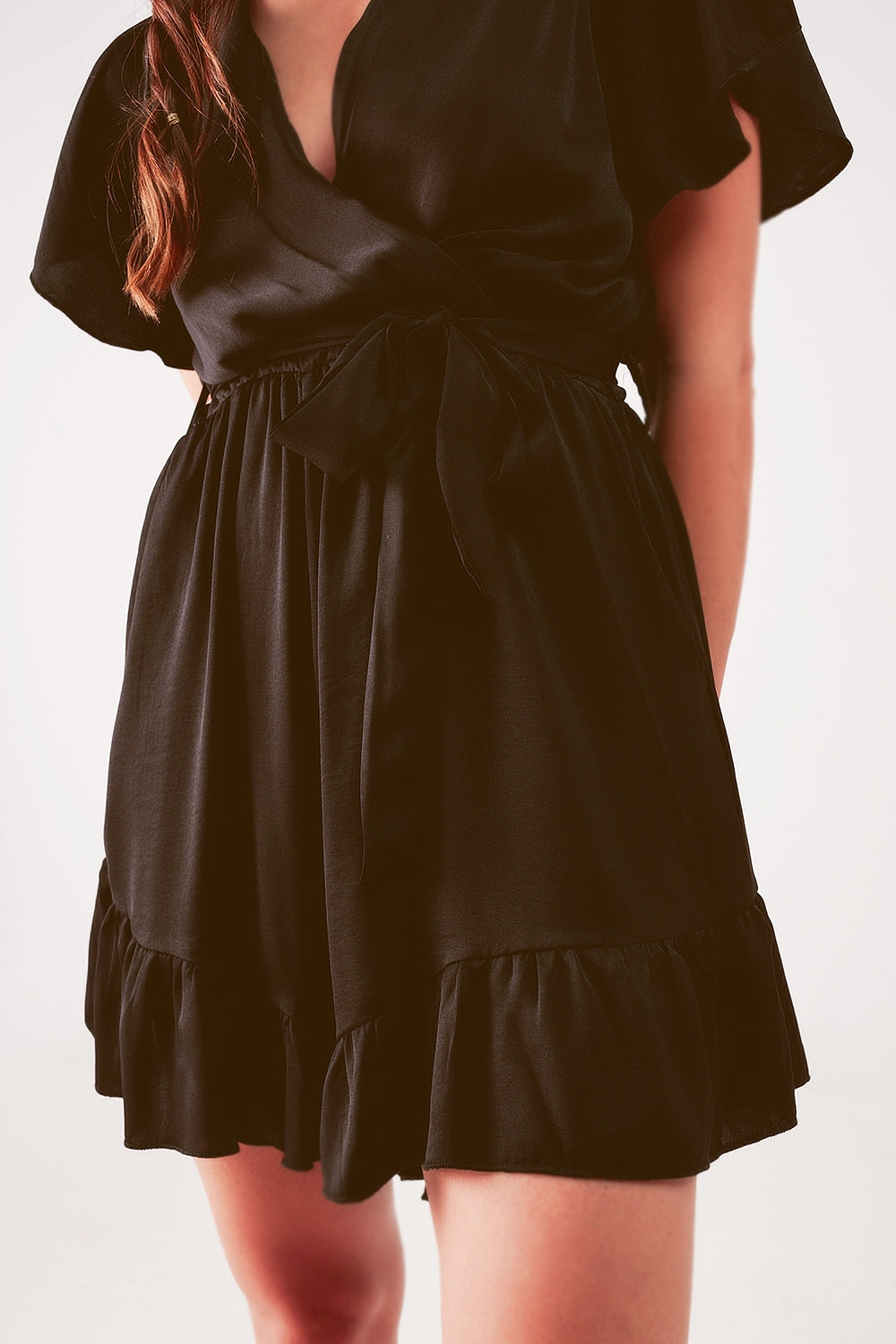 Wrap front frill hem jumpsuit in black - Dresses