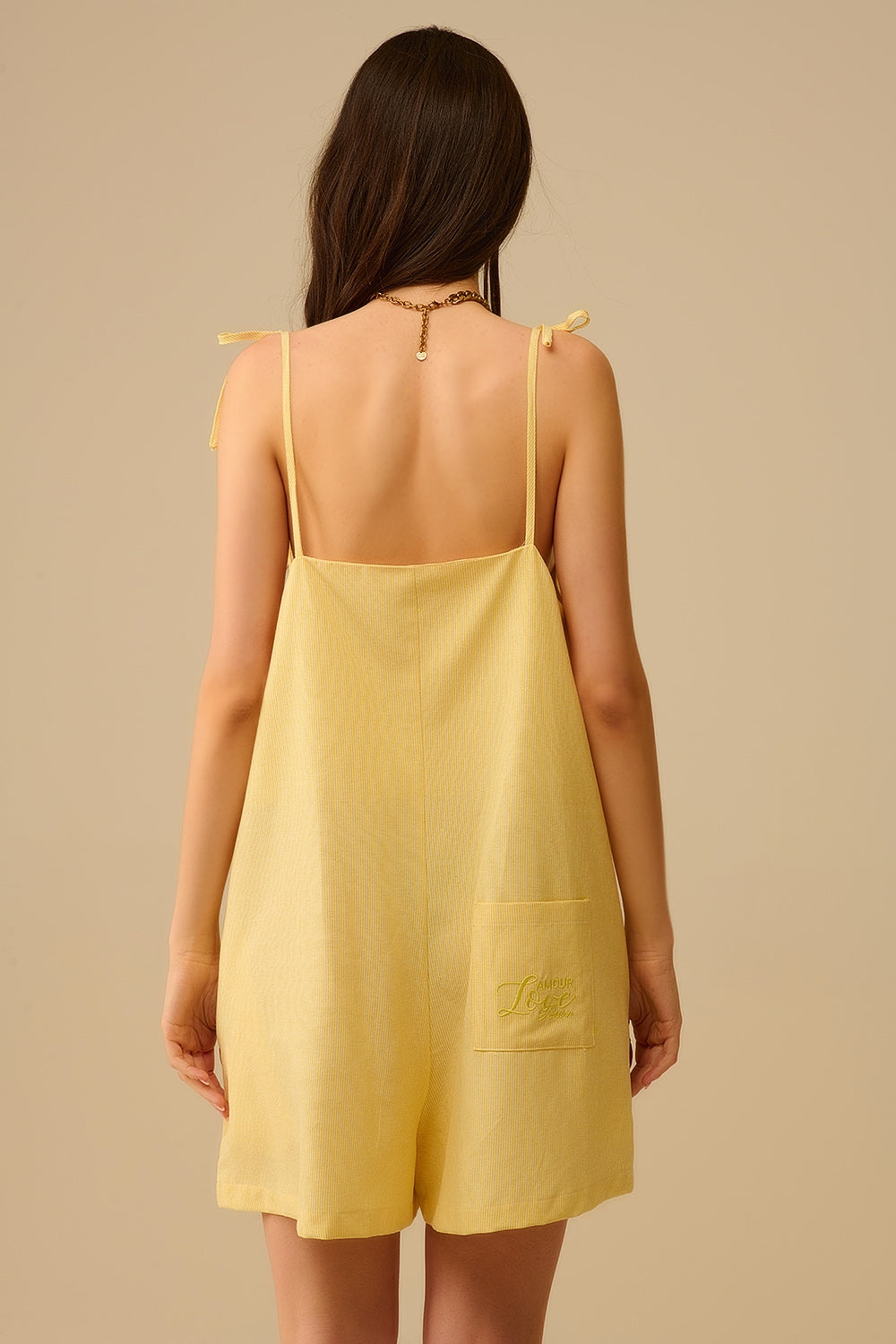 Yellow striped playsuit with shoulder ties and back pocket detail - Dresses