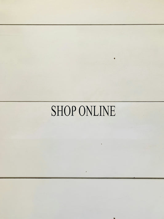 black text labeled Shop Online