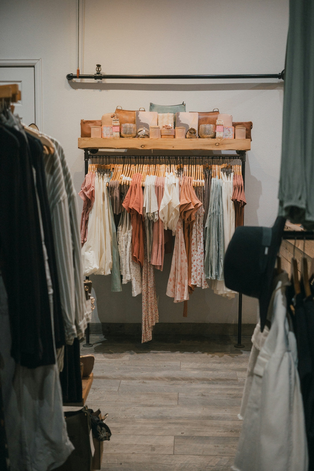 Racks of women's clothing displayed in a boutique.