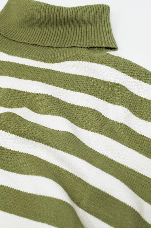Green oversized trutleneck sweater with white stripes and splits on the side