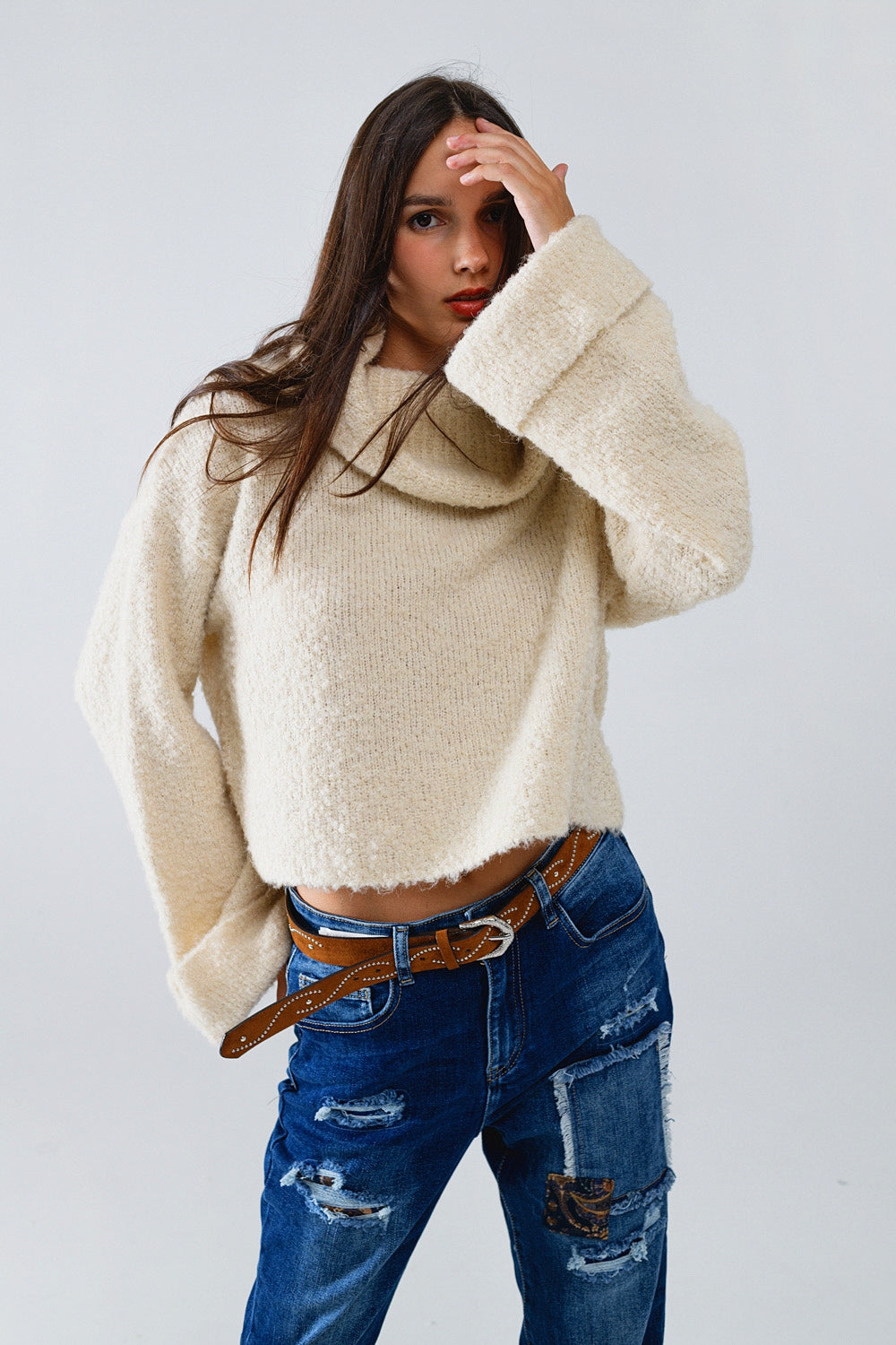 knitted fluffy high neck sweater in cream