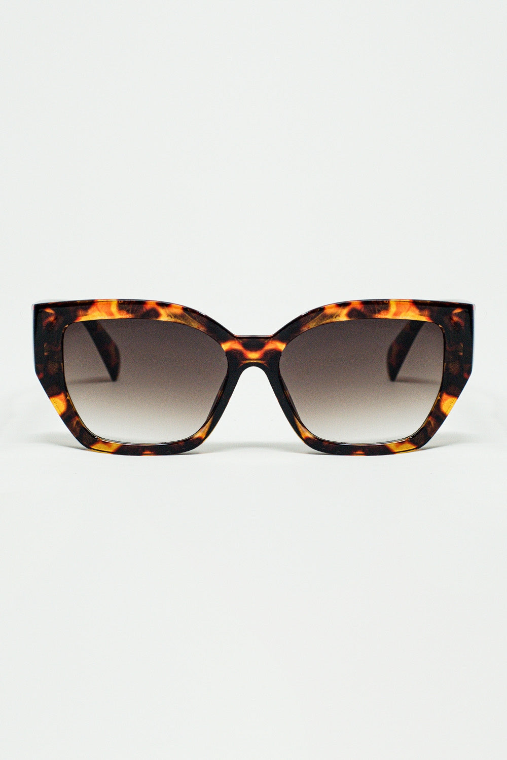 geometric polarized sunglasses with gradient dark lenses and tortoise shell