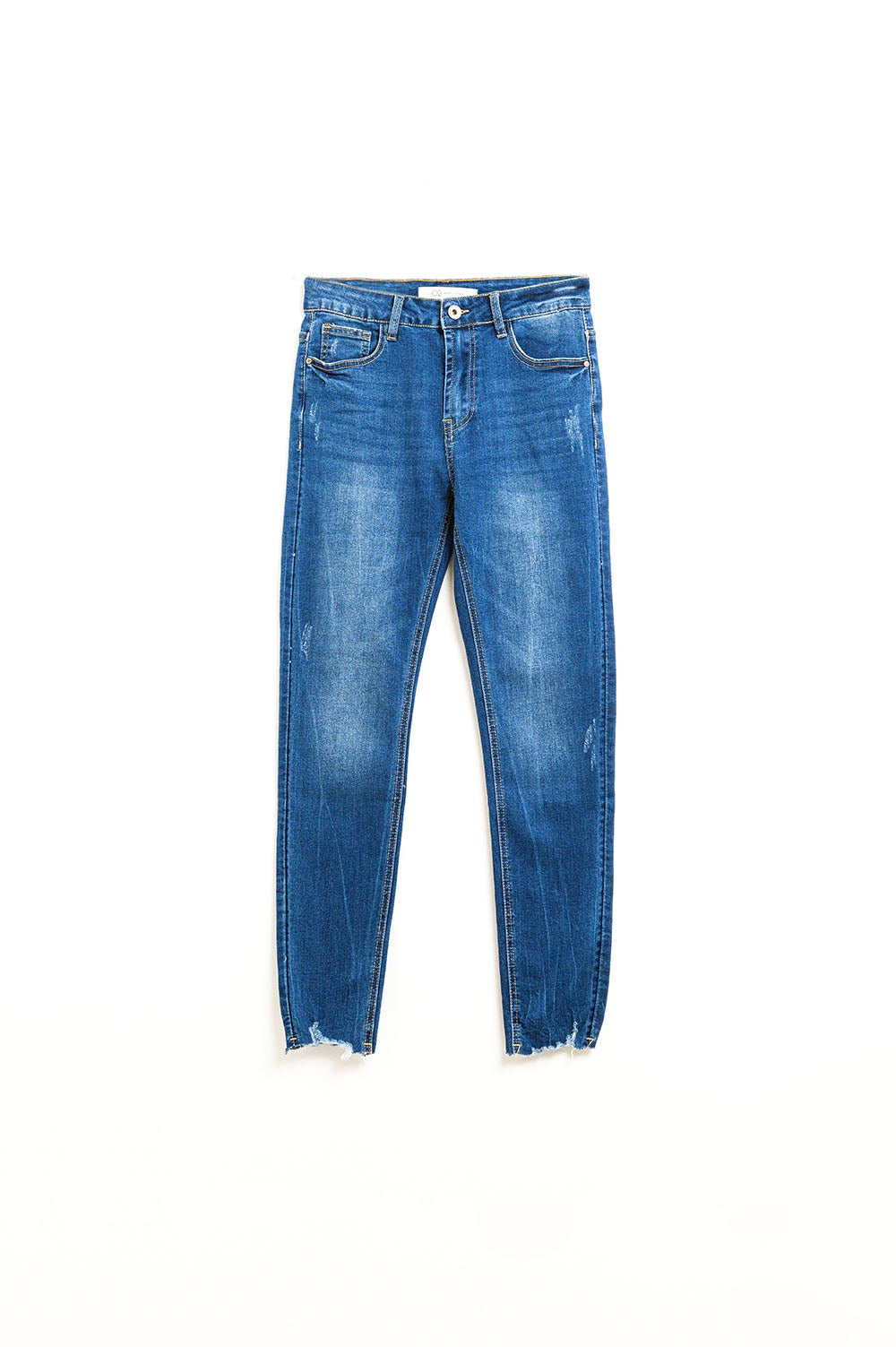 Super skinny jeans in medium wash with rips at the bottom