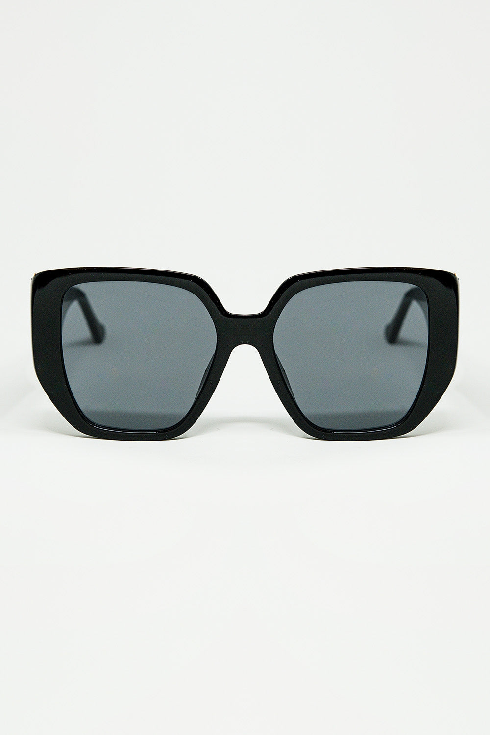 Black pin-up style sunglasses with geometric design and cat eyes