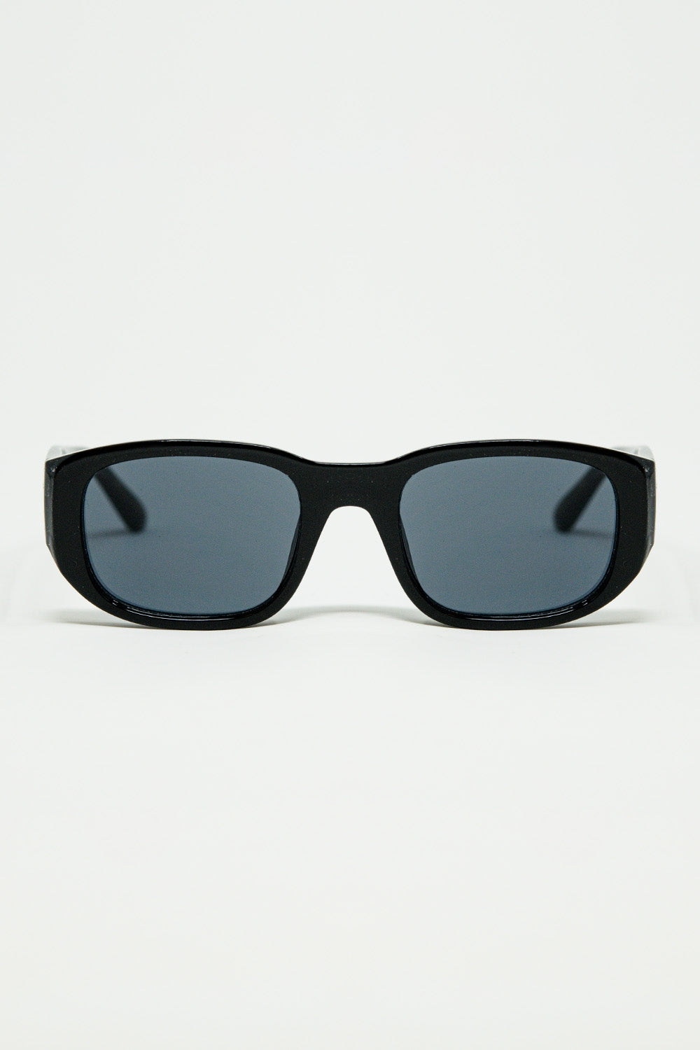 Oval Sunglasses with High Gloss Transparent Frames in black