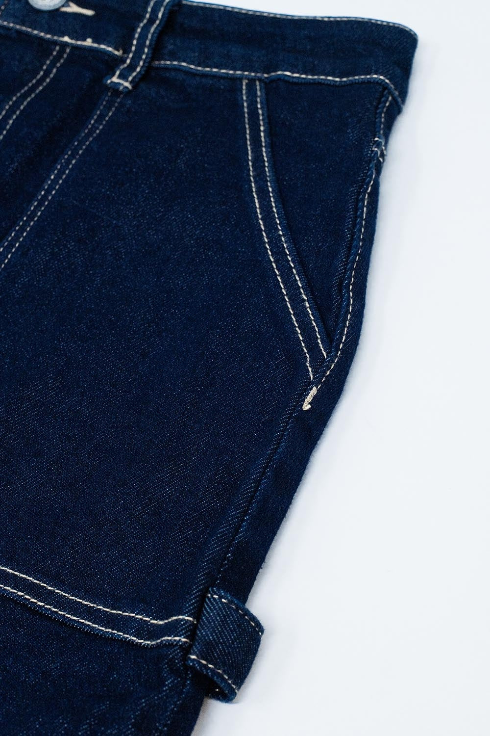 Dark wash denim mini skirt with front pockets
