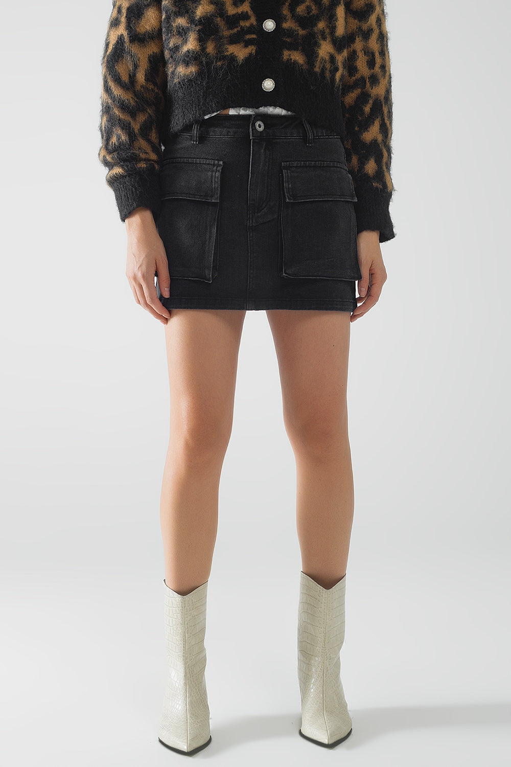 Black denim miniskirt with cargo pockets