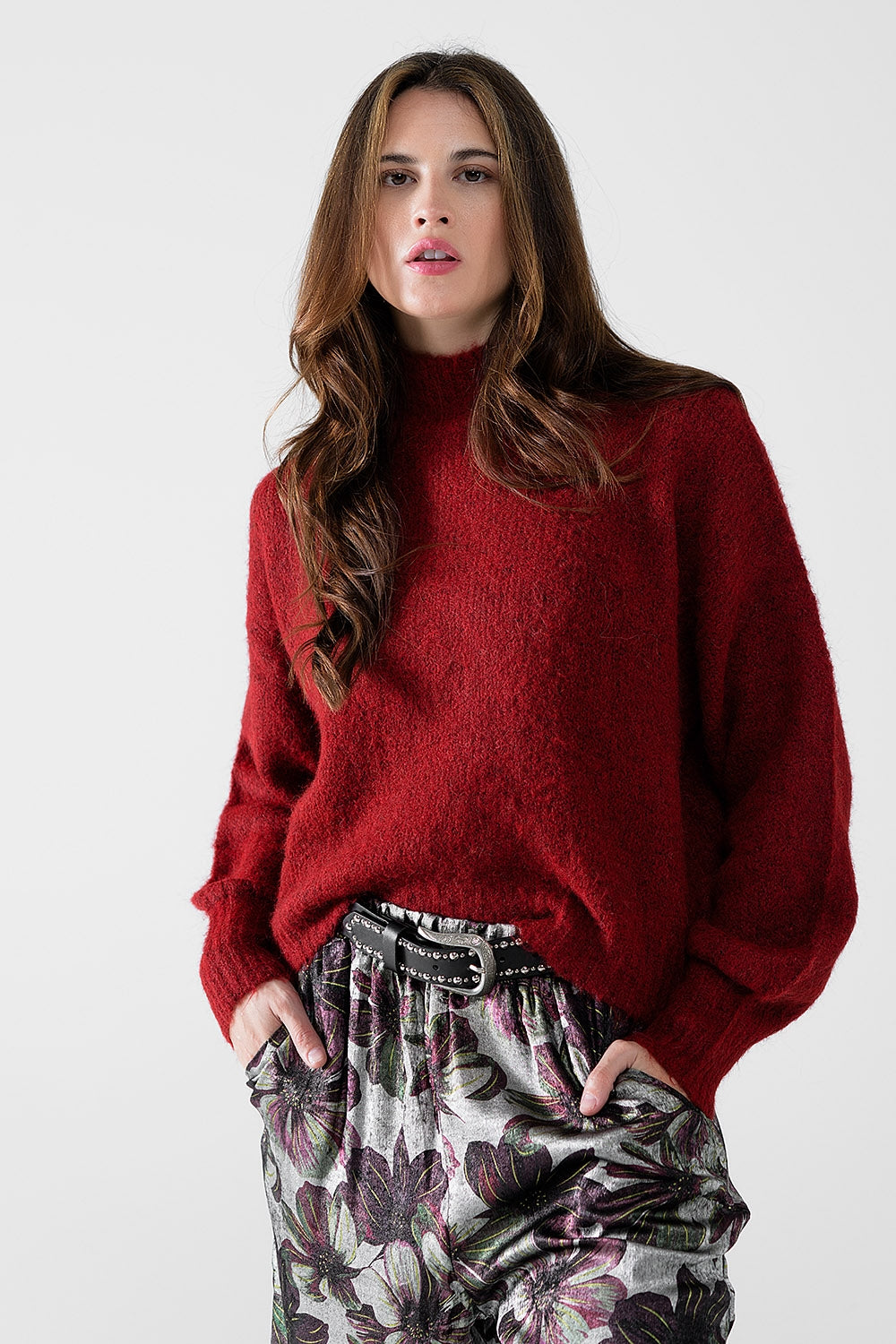 Fluffy red sweater with high neck and balloon sleeves