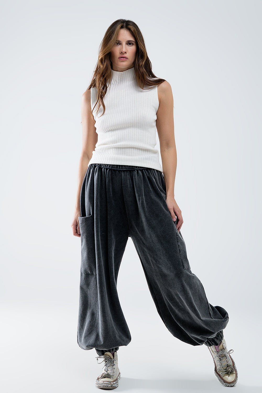 Sleeveless fine knit wool sweater in ecru - jumper