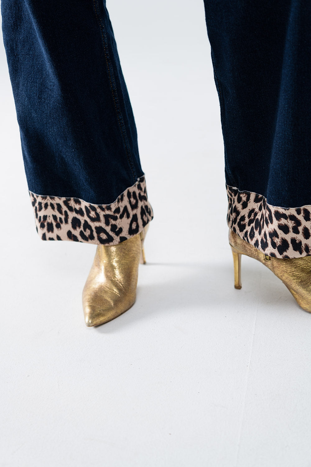 Dark wash wide leg jeans with leopard detail at the bottom - Denim
