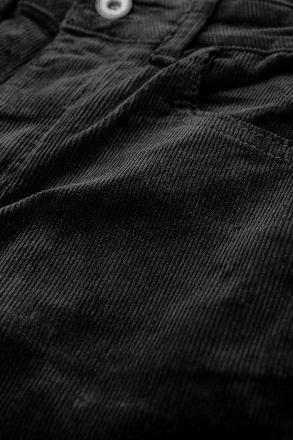 Black corduroy flare pants with leopard print at the bottom - trousers
