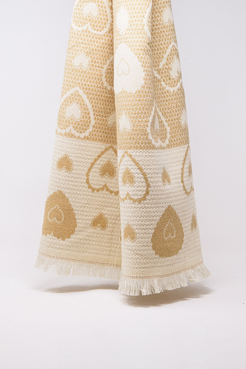 beige scarf with heart print and golden thread detail