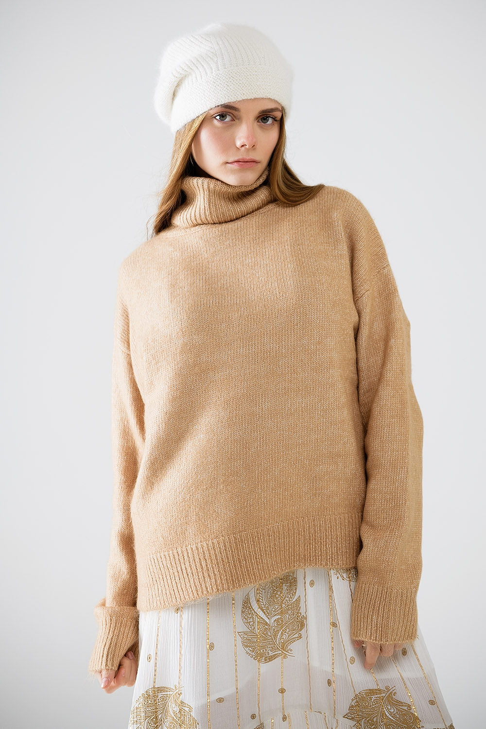 Beige turtleneck jumper with dropped sleeves