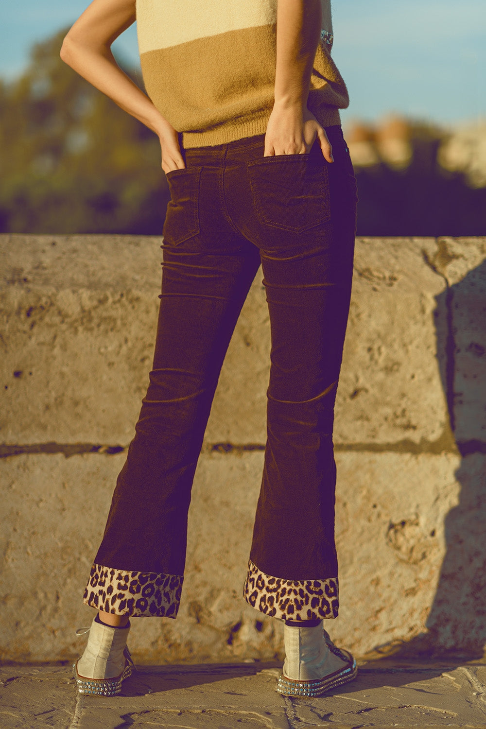 Brown corduroy flare pants with leopard print at the bottom - trousers