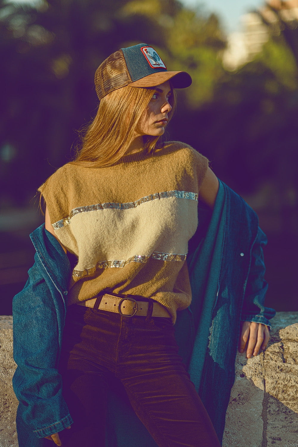 Sleeveless beige sweater with sequin detail