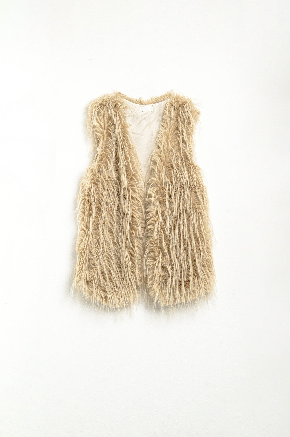 vest in beige in long fur
