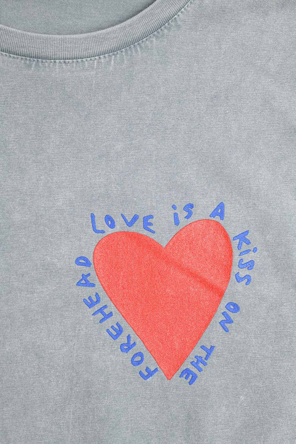 Grey T-shirt featuring a heart design on both the front and back - top