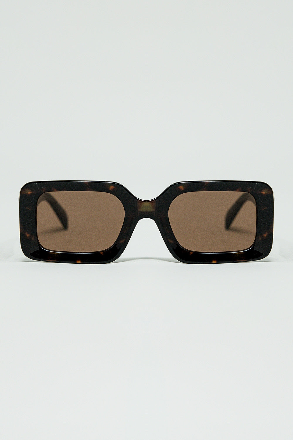 brown square sunglasses with green animal print on the side