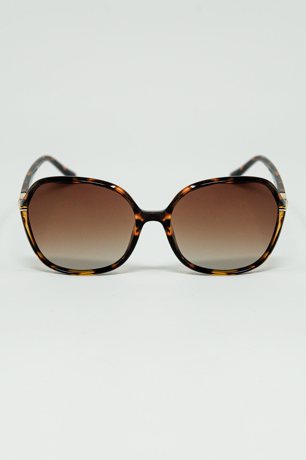 Round beige printed sunglasses with gold metal detail