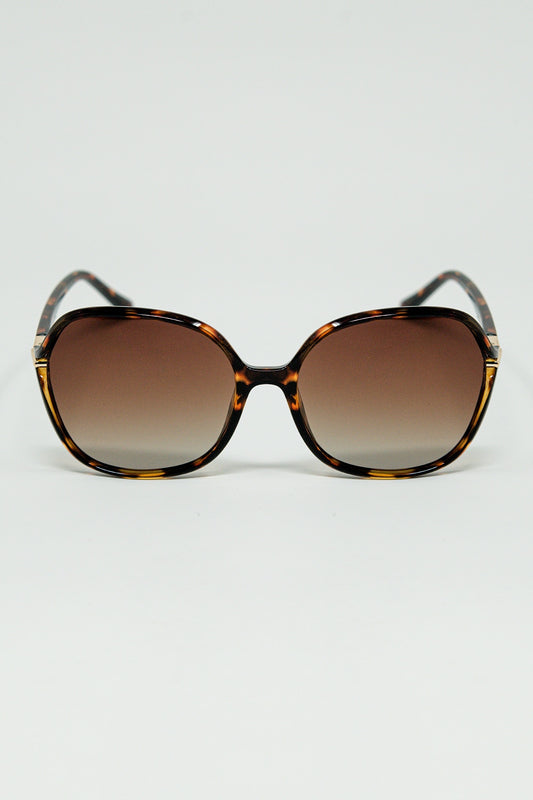 Round beige printed sunglasses with gold metal detail