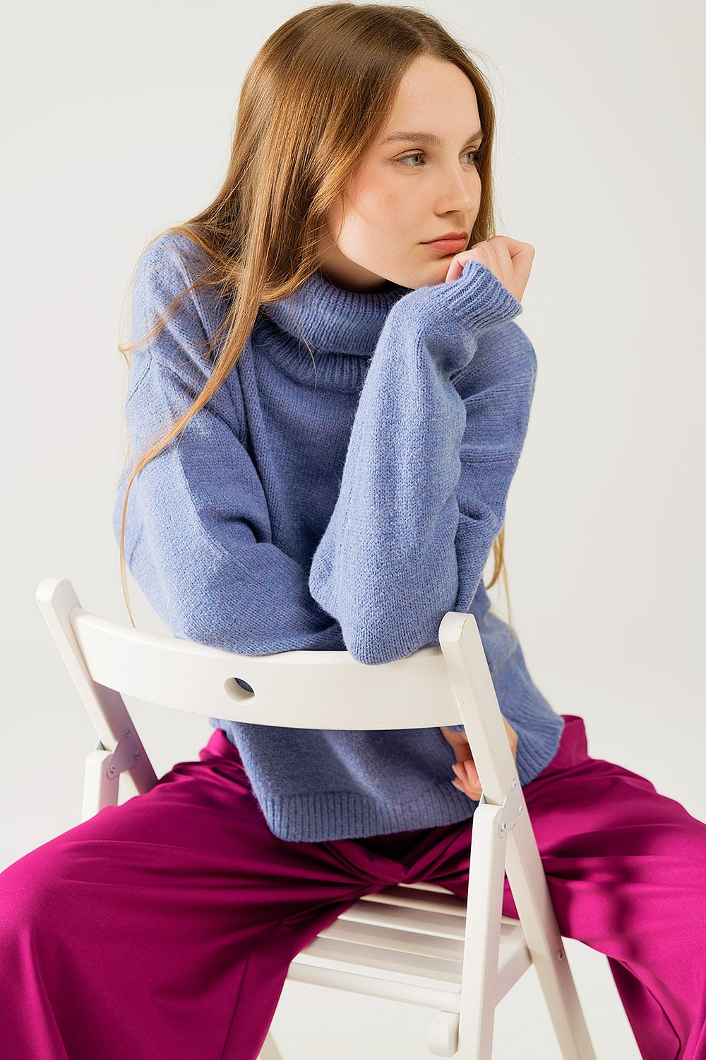 Loose blue sweater with dropped sleeves