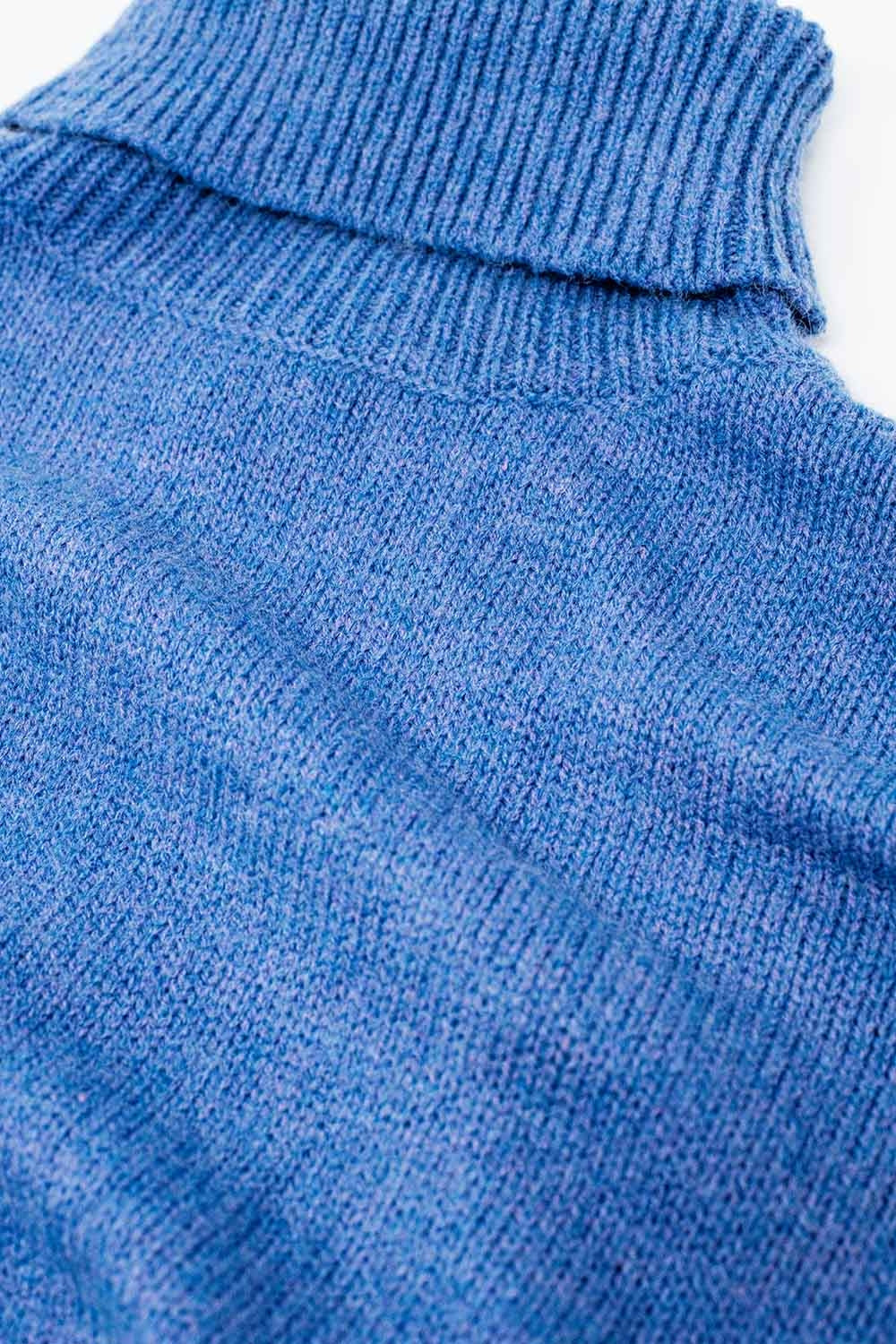 Loose blue sweater with dropped sleeves