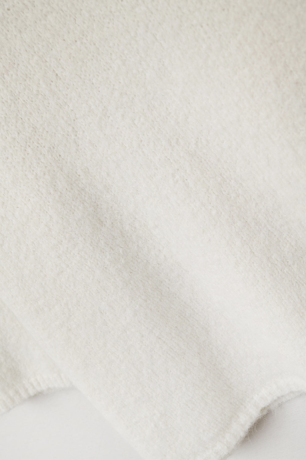 cream Fluffy sweater with three-quarter sleeves and round neck
