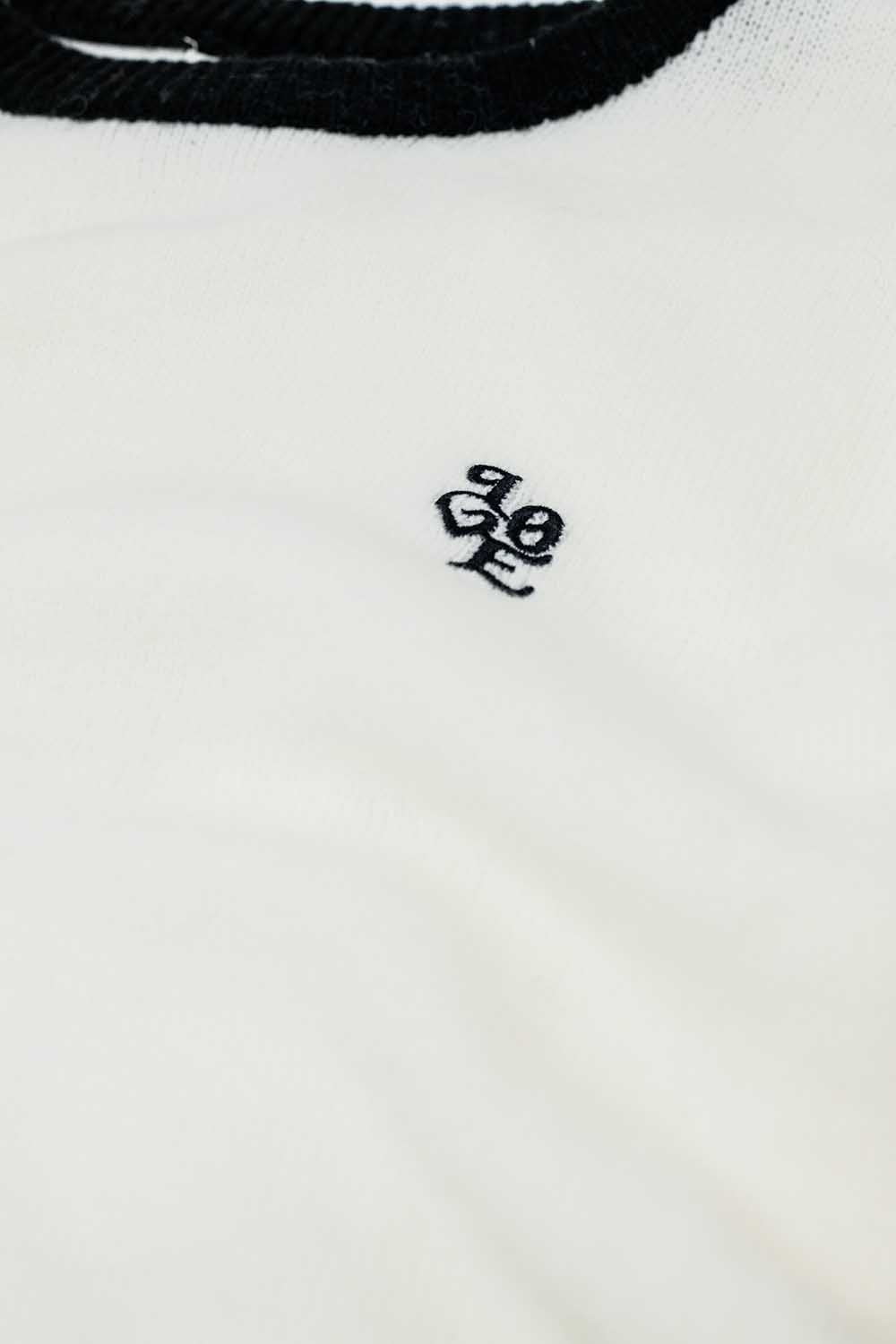 White sweater with contrasting collar and love logo on chest - jumper