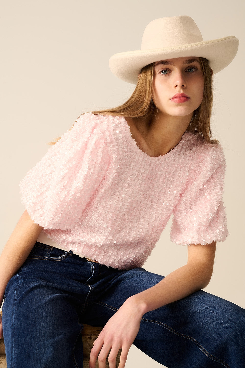 Pink top with sequin detail and balloon sleeves