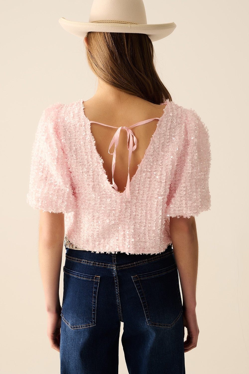 Pink top with sequin detail and balloon sleeves