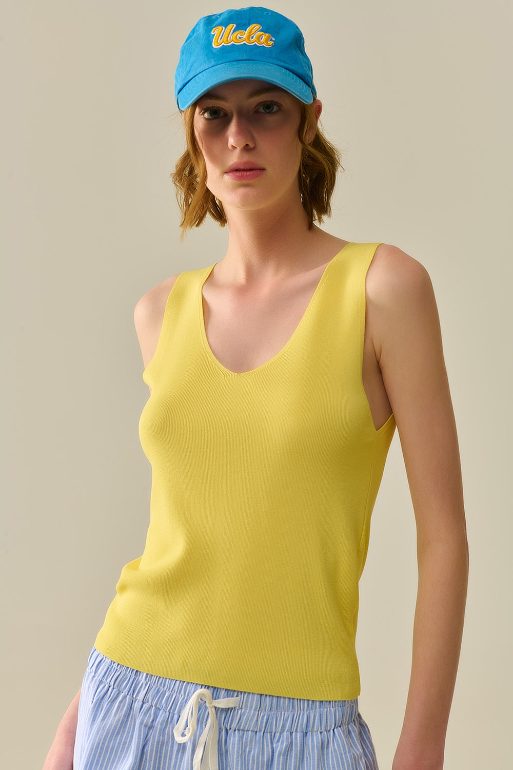 Yelow sleeveless fine knitted top With V-Neck
