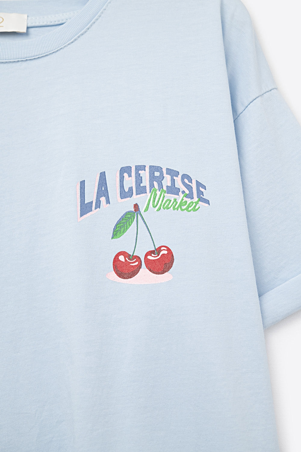 Blue T-shirt with La Cerise Market Saint-Tropez graphic - top
