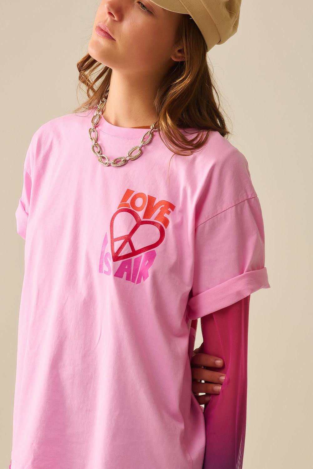 Pink T-Shirt with Love is Air and Heart with Peace logo - top