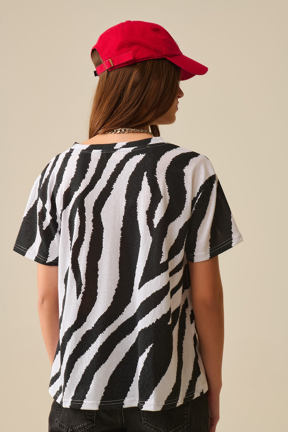V-neck t-shirt with black zebra print - top