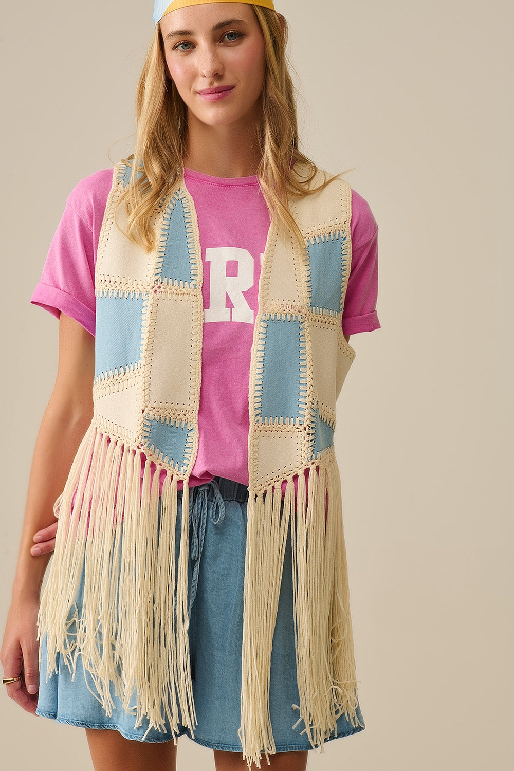 Faux leather vest with patchwork and fringe detail