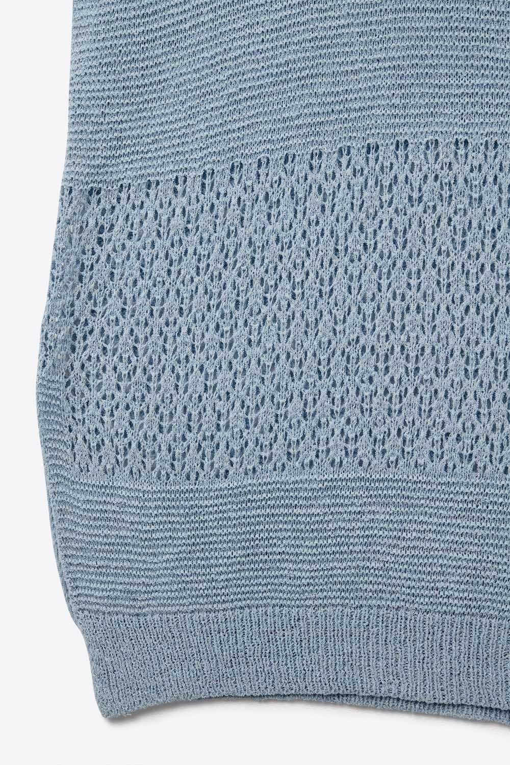 Blue sweater with soft open knit and dropped sleeves