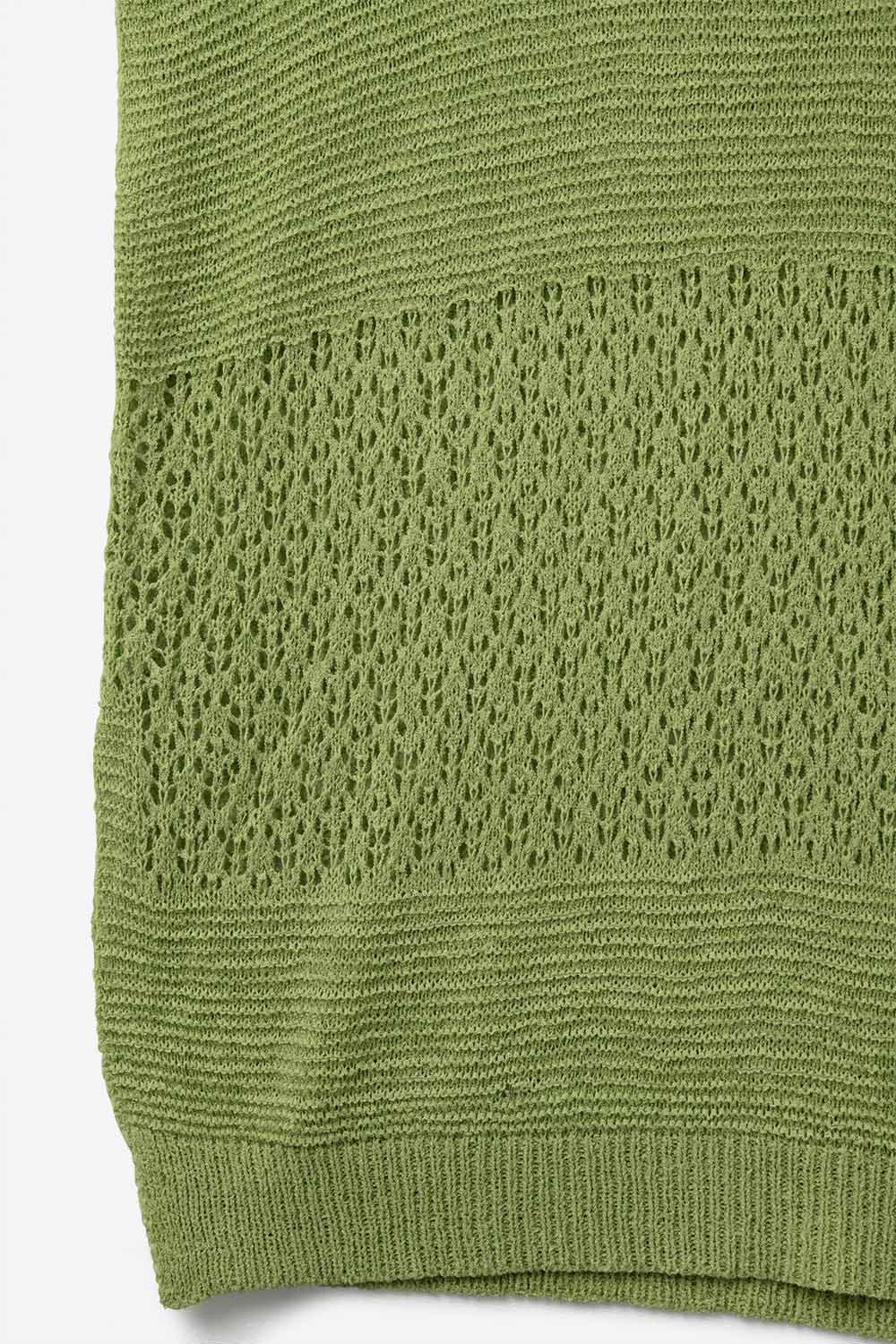 Green sweater with soft open knit and dropped sleeves